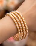 Classic Pearl-Embellished Gold-Toned Bangles