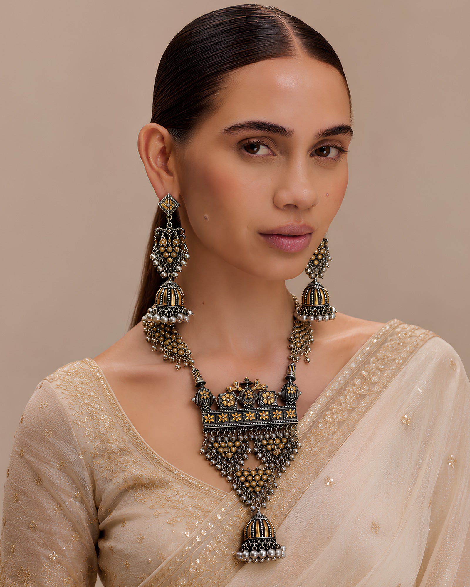 Dual-Tone Architectural Shield & Tiered Mesh Jhumka Haar Set
