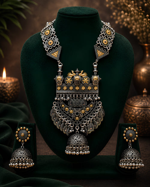 Dual-Tone Architectural Shield & Tiered Open-Work Jhumka Haar Set