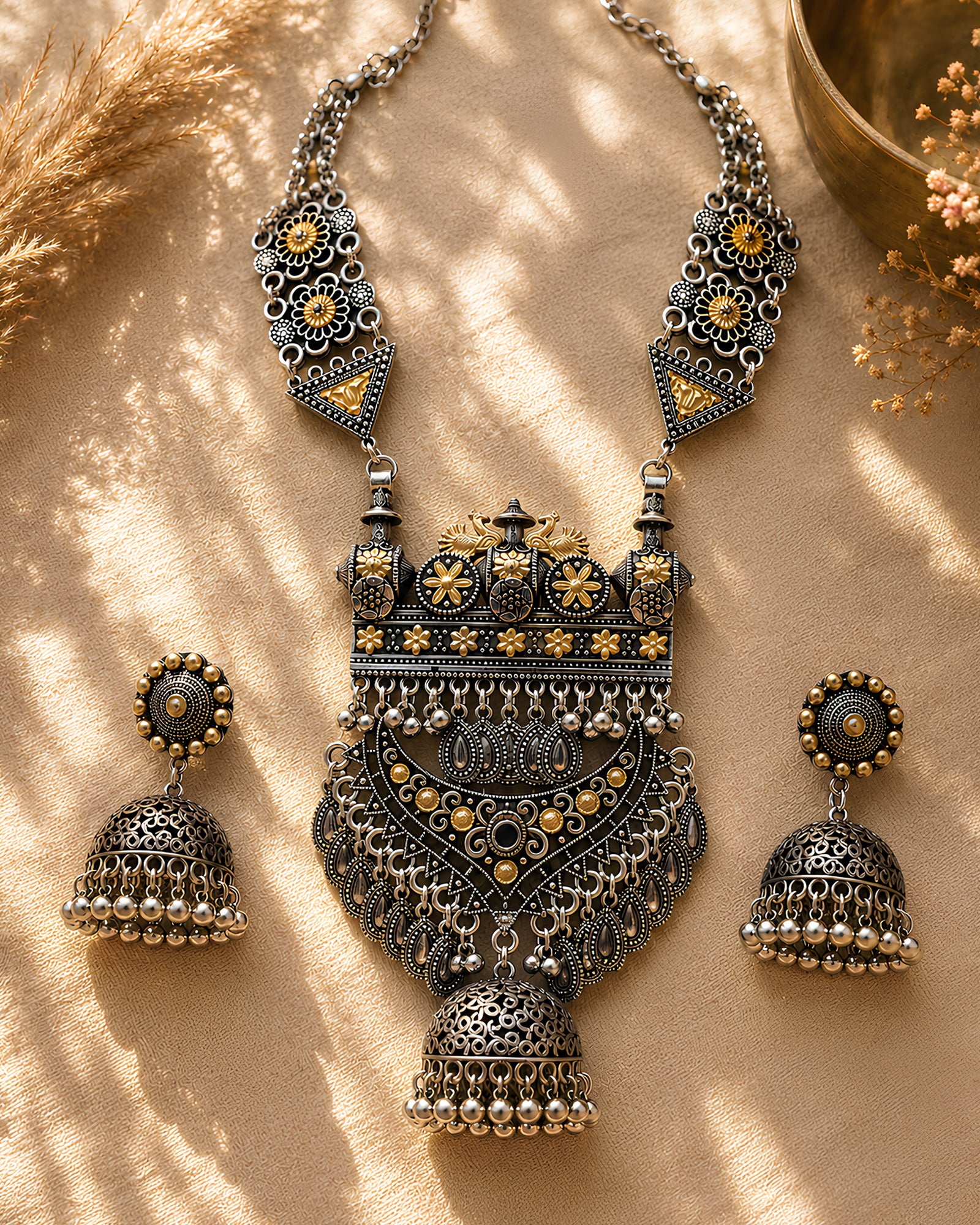 Dual-Tone Architectural Shield & Tiered Open-Work Jhumka Haar Set