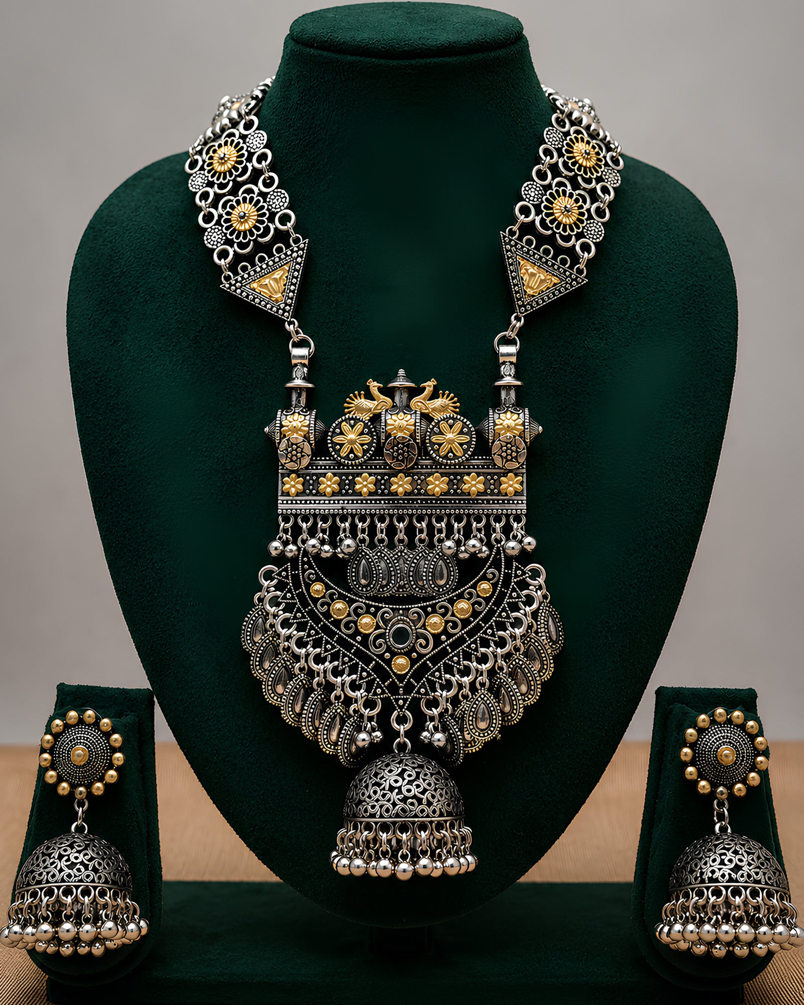 Dual-Tone Architectural Shield & Tiered Open-Work Jhumka Haar Set