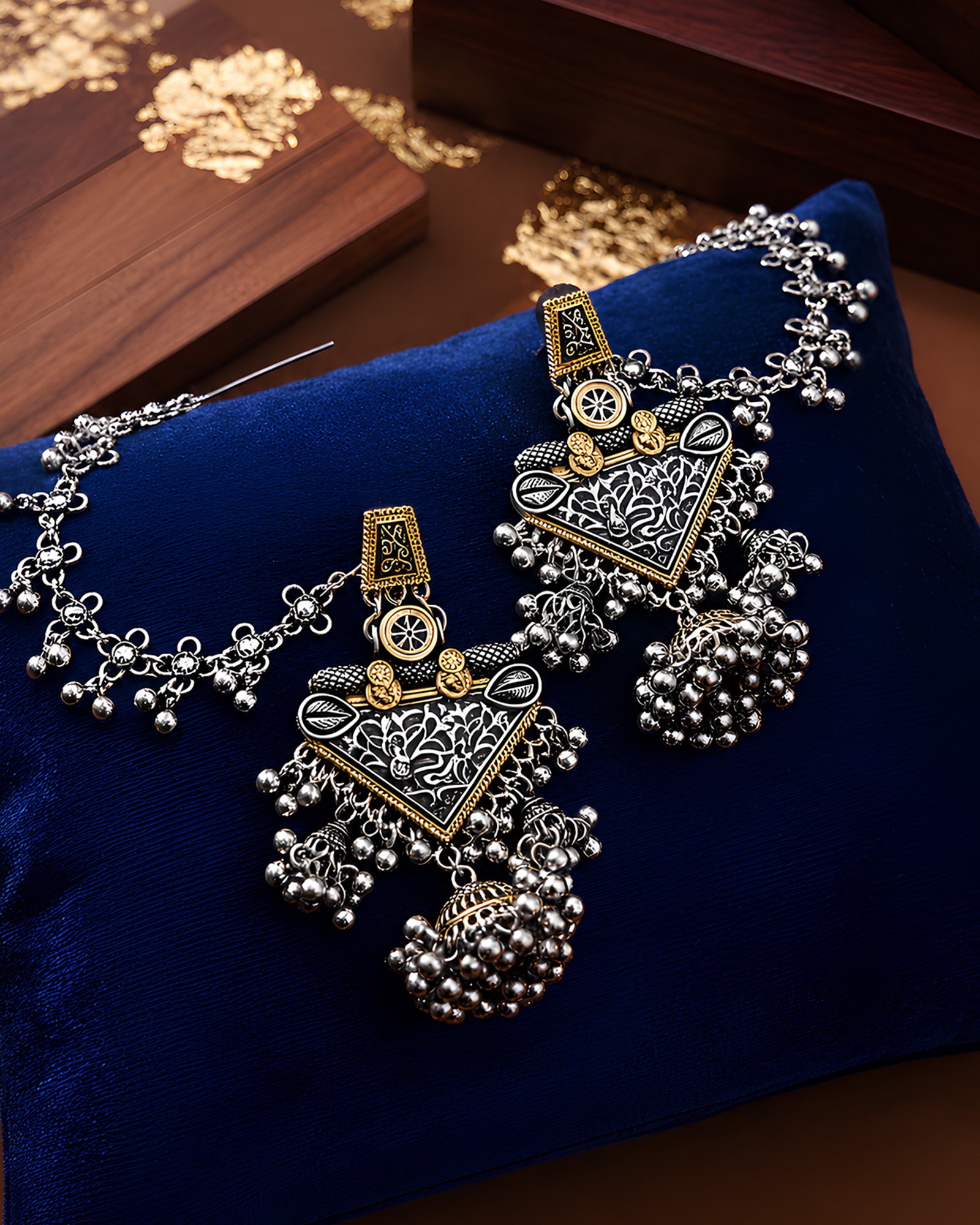 Dual-Tone Floral Shield Oxidized Jhumkas with Hair Chain
