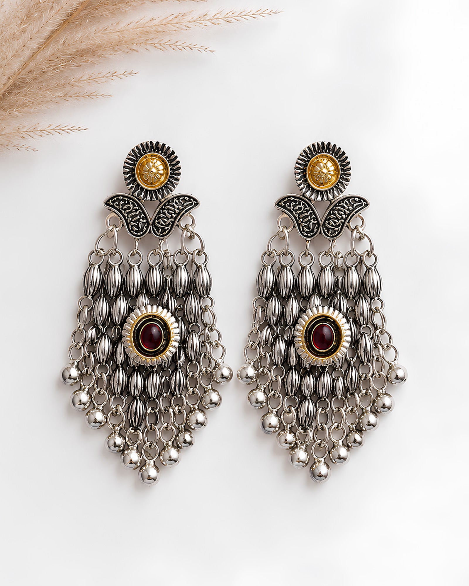 Dual-Tone Ruby Center-Stone Tassel Oxidized Danglers