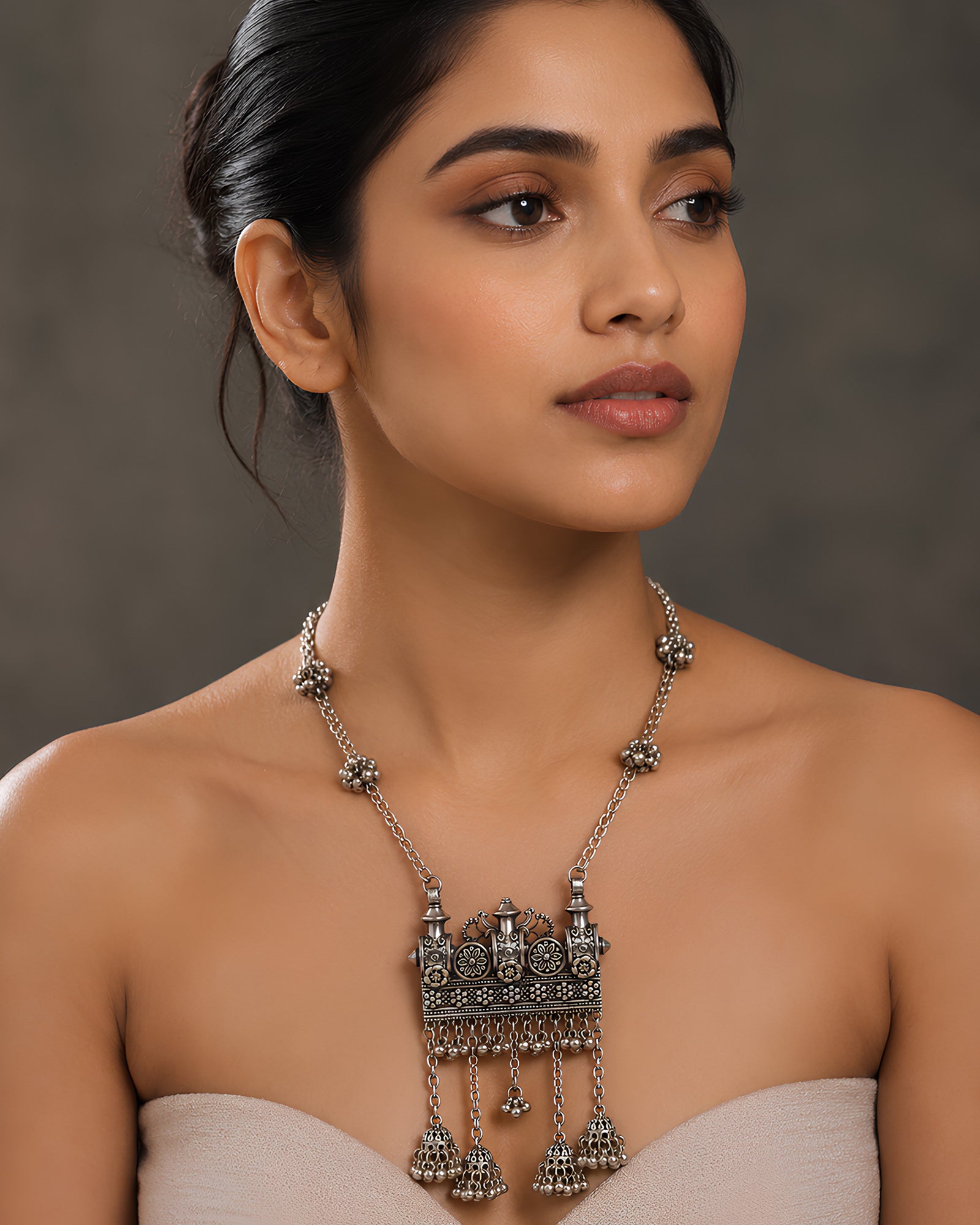 Floral Motif Temple Panel & Jhumka-Fringed Oxidized Necklace