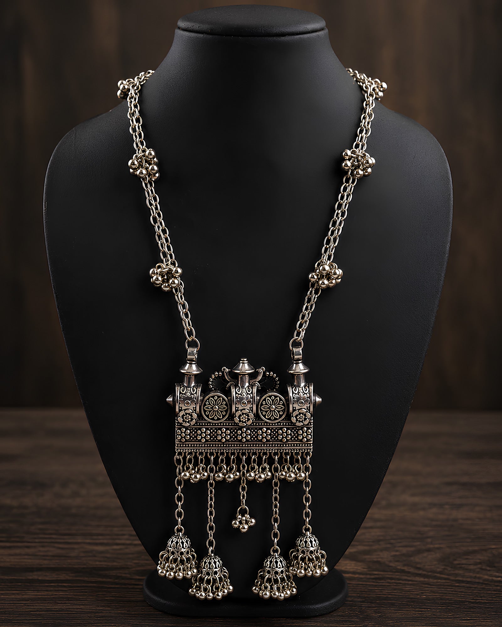 Floral Motif Temple Panel & Jhumka-Fringed Oxidized Necklace