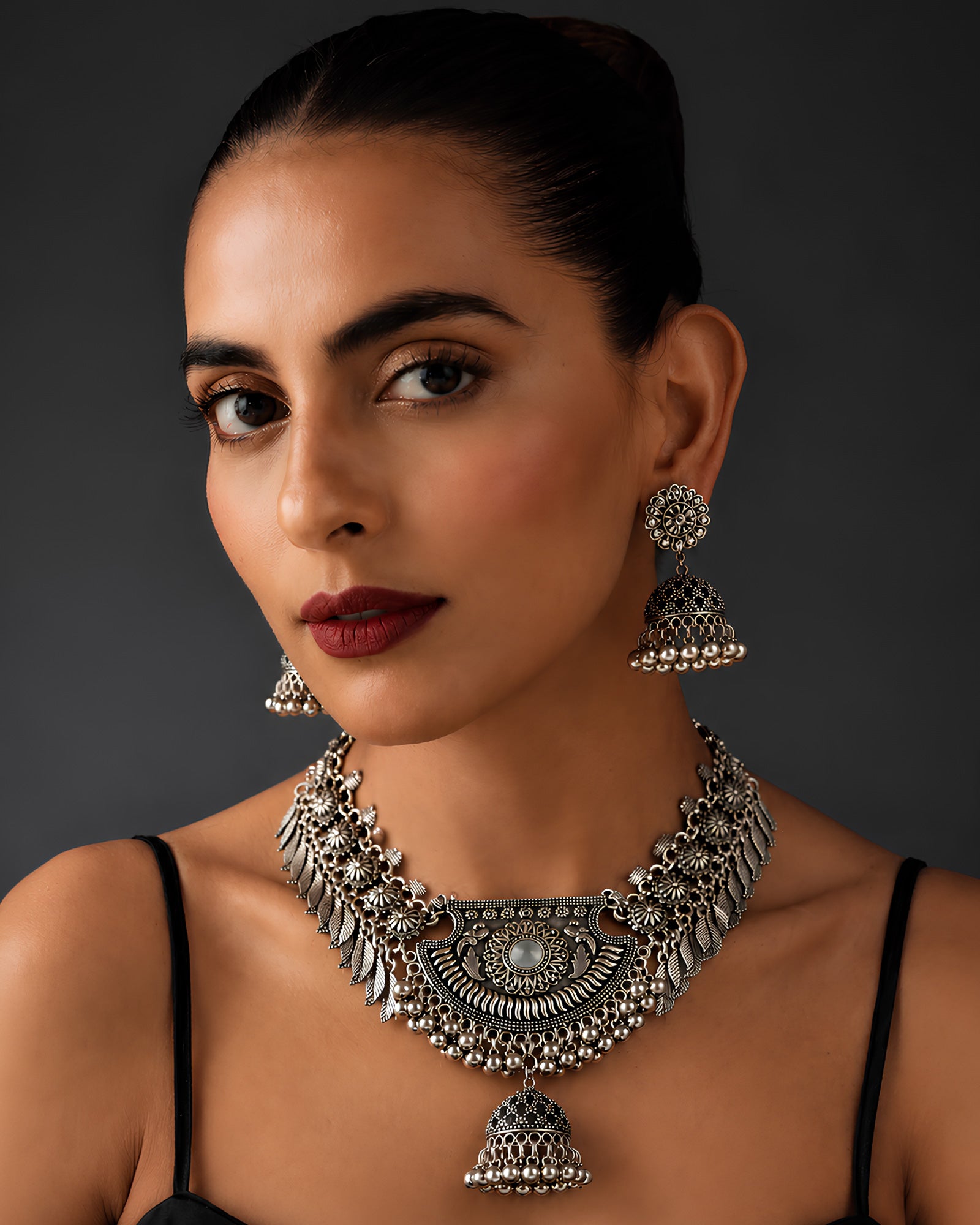 Oxidized Crescent Shield & Leaf-Fringed Jhumka Necklace Set