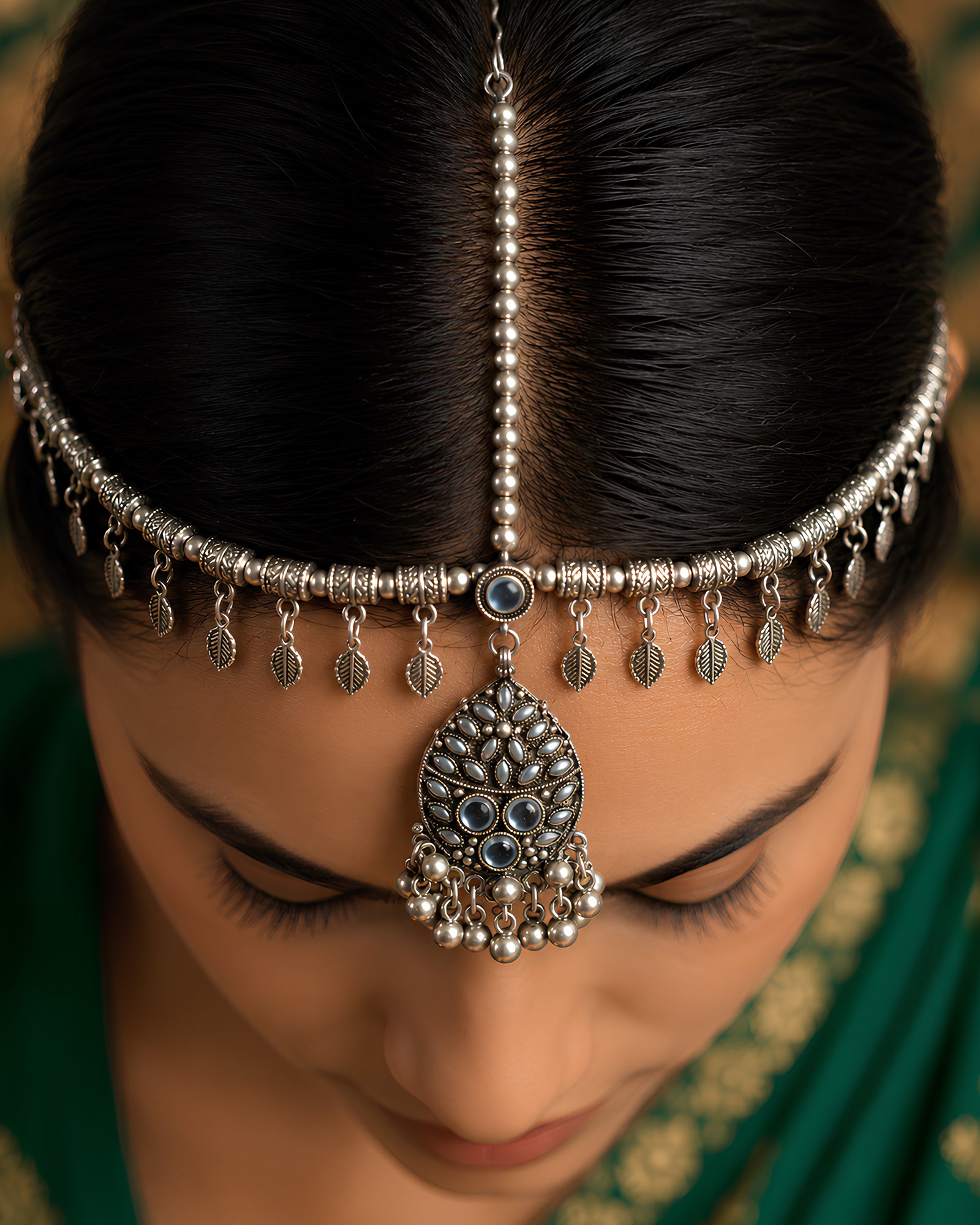 Oxidized Silver Stone-Embedded Shield & Leaf-Fringed Matha Patti
