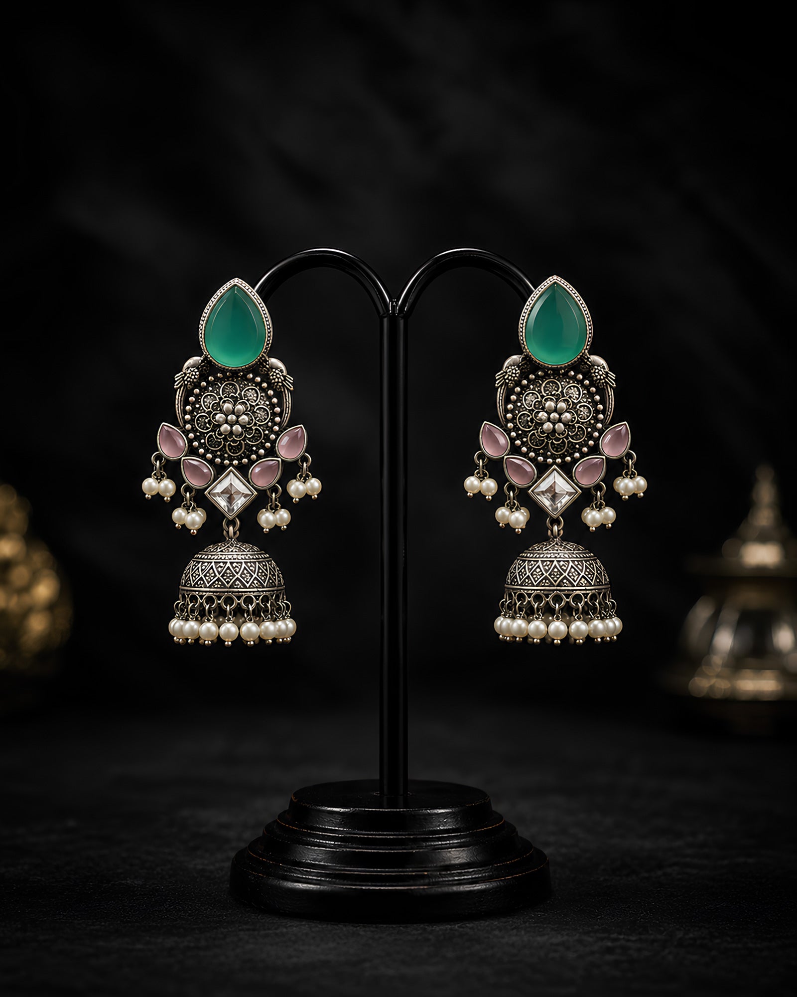 Silver Oxidized Sea Green Stone Ornate Jhumka Earrings