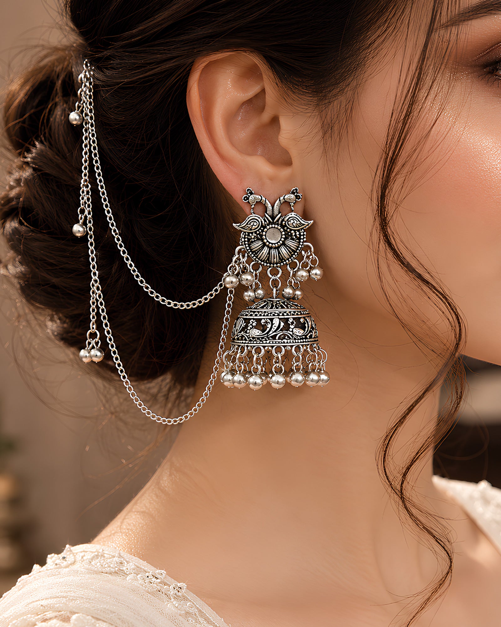 Traditional Peacock Motif Oxidized Jhumkas with Multi-Layer Hair Chain