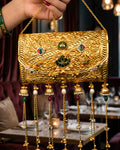 Vintage Gold Carved Lotus Emblem Jhumka Bag